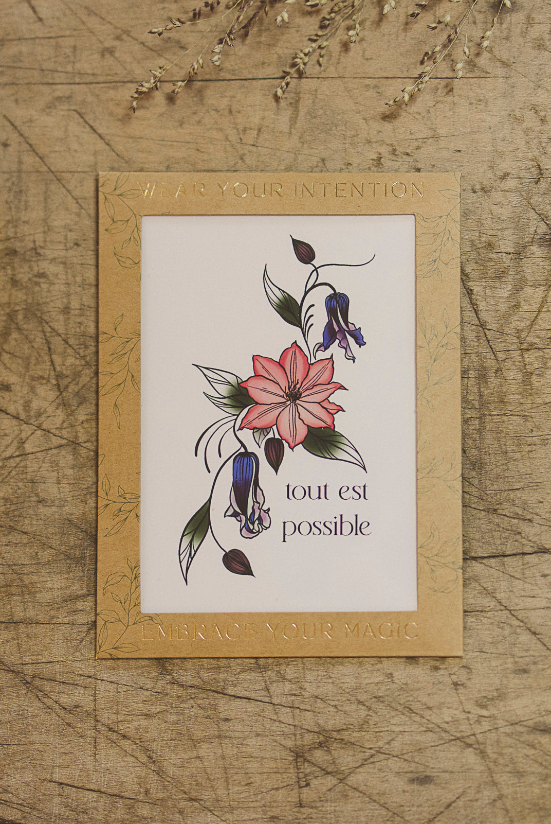 "Tout Est Possible" Clematis temporary tattoo in packagine from Orchid and Pine Tiny Intentions collection.