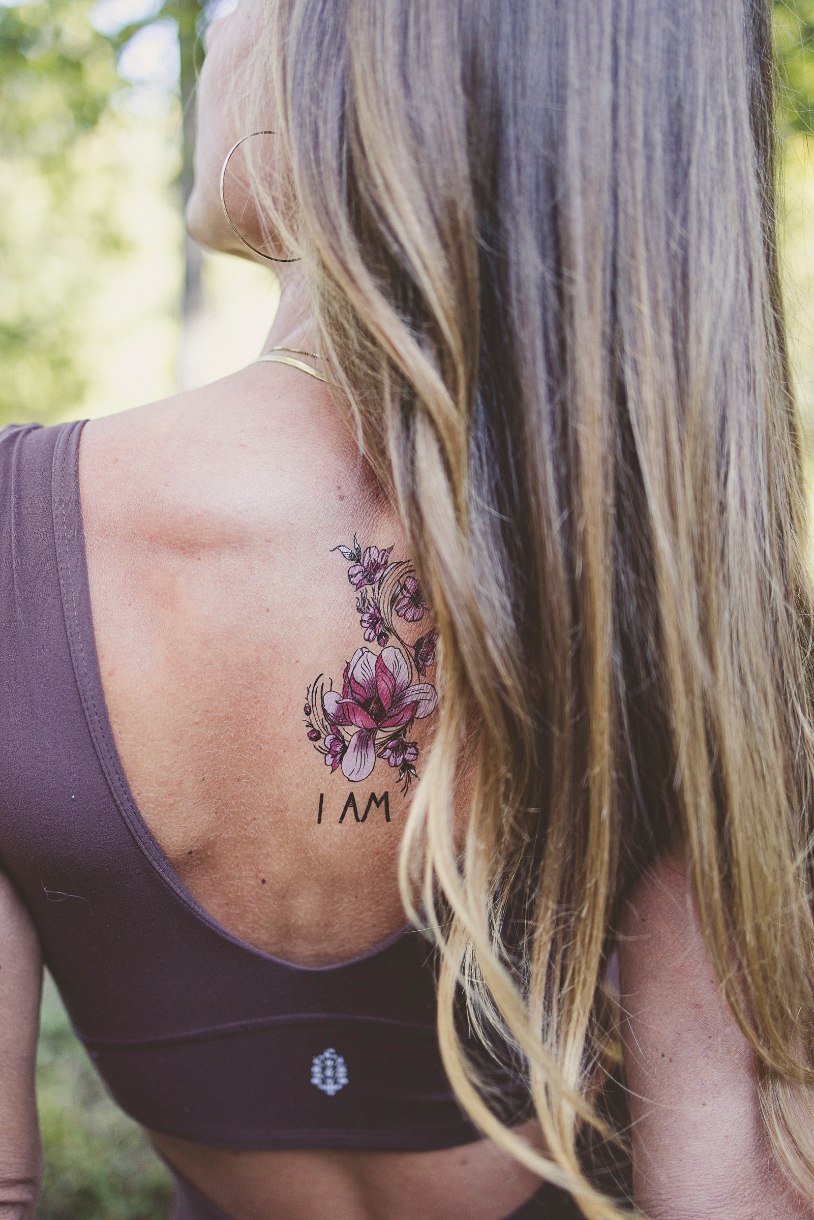 Close-up of "I Am" affirmation tattoo on wrist, serving as a daily mindful reminder