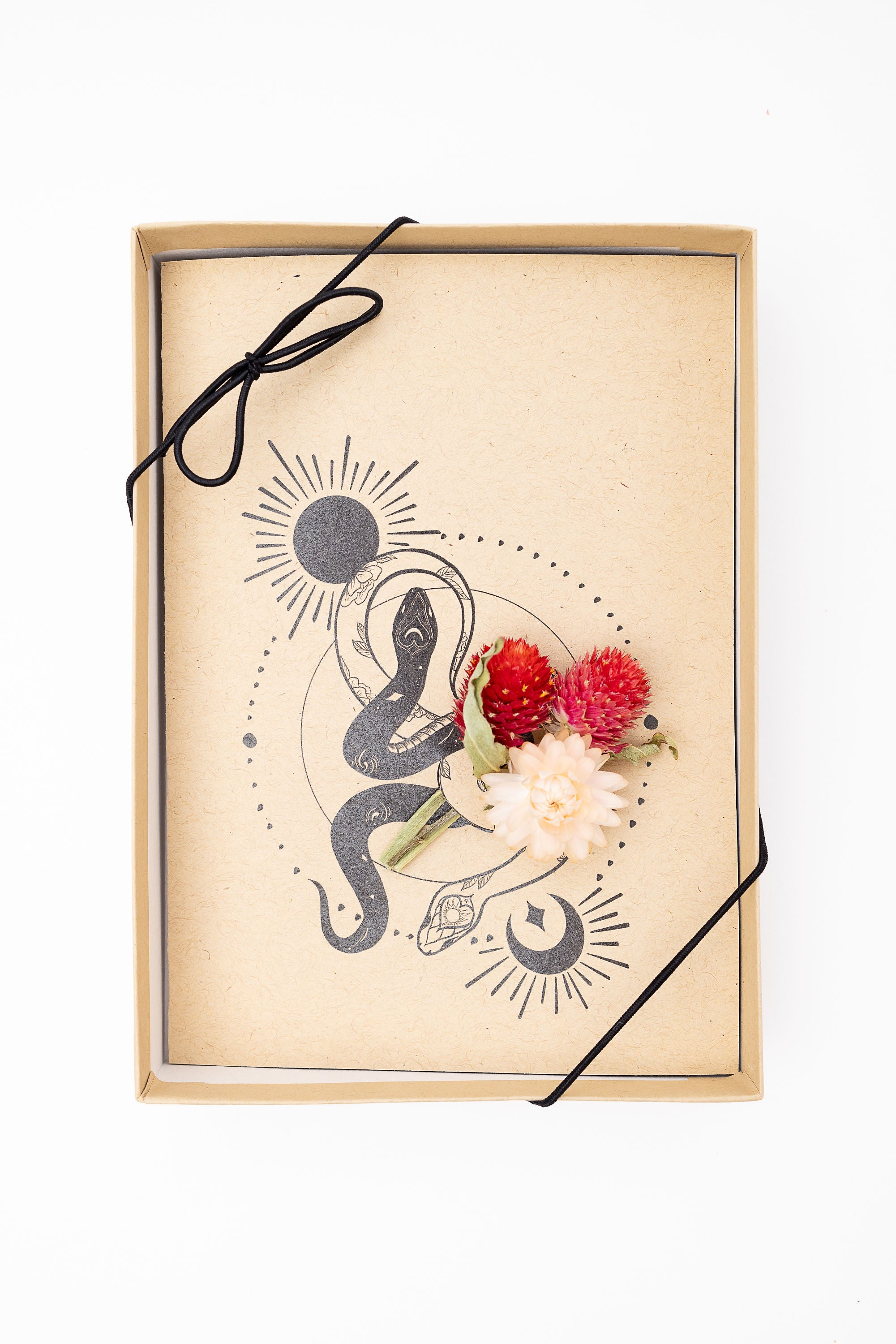 Handmade dried flower greeting card with snake illustration inside gift box